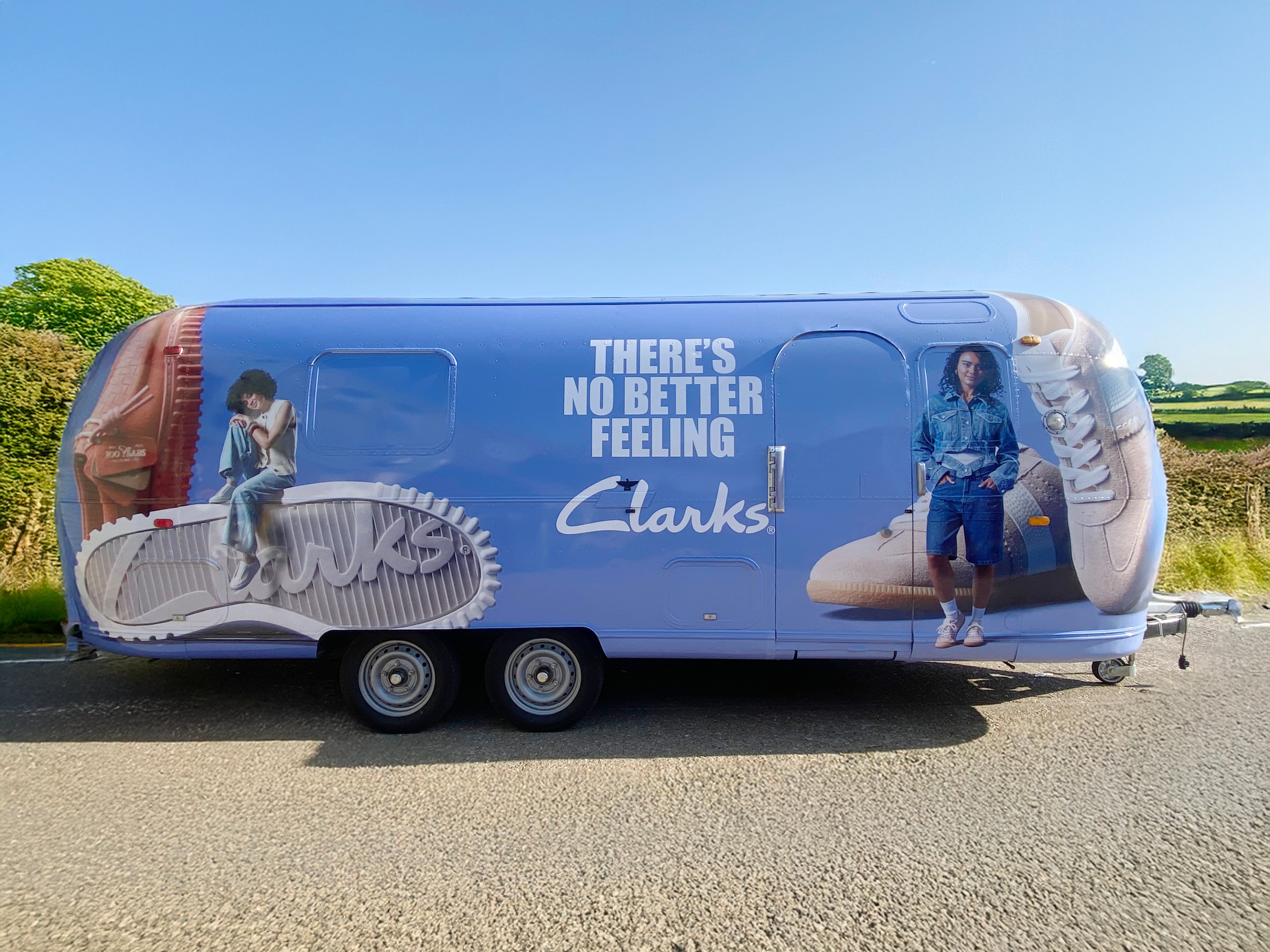 A blue Airstream, one of the promotional vehicles used by Clarks in its footwear campaign.
