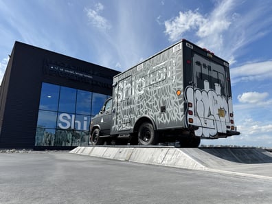 A branded American ambulance, hired and branded to look like stylish graffiti.