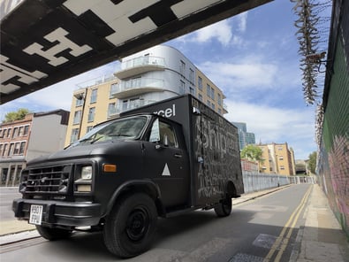 The matt black Vercel American ambulance touring London.