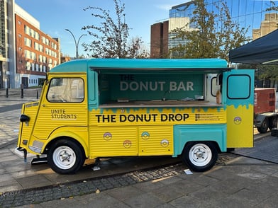 The Donut Drop H-Van for a food sampling event.