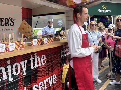 Andy Murray stands with the Walker's H-Van, outside Morrison's, for one of the brand's biggest influencer event ideas.