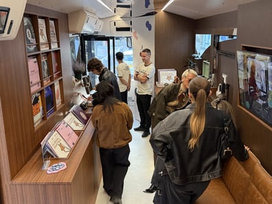 Gen Z guests enjoy the Spotify & COACH Tabby Your bus.