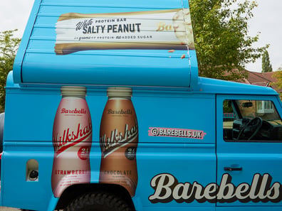Land Rover Defender ideas - the pop-up roof on the custom Land Rover Defender for Barebells, with the milkshakes visible.