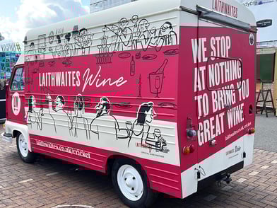 The red Laithwaite's Wine classic Estafette, viewed from behind.
