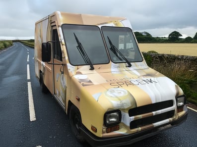 A gold and white post van for SPACENK, on the road to an experiential marketing campaign.