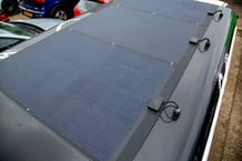 Black Kraken Land rover Defender with solar panels