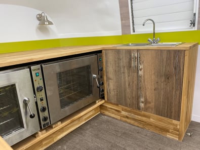 Inside the Apetito mobile kitchen, with sink.