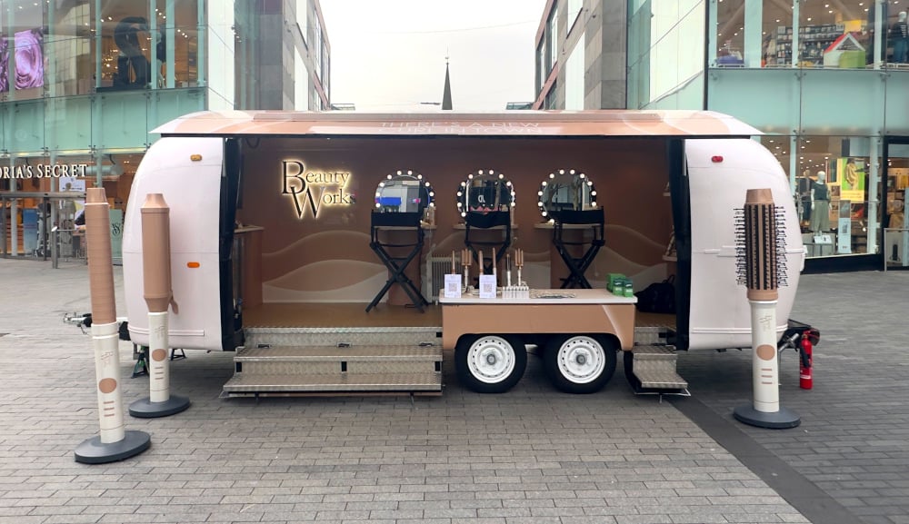 The Beauty Works immersive launch campaign Airstream, in place with 3D props.