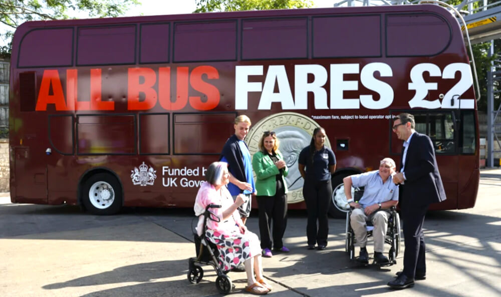 The UK government's billboard bus as part of a promotional campaign, with Andy Burnham pictured.
