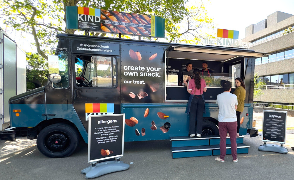 Promohire's FedEx delivery truck for hire, this time branded and fitted out for KIND Snacks' taste toppings tour in London.