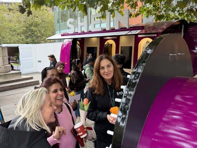 Spin-to-win games at SHEIN's Fall/Winter fashion marketing pop-up event.