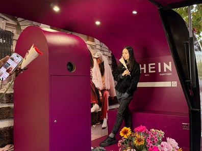 A woman poses for a photo at SHEIN's 'Goes With Everything' campaign.