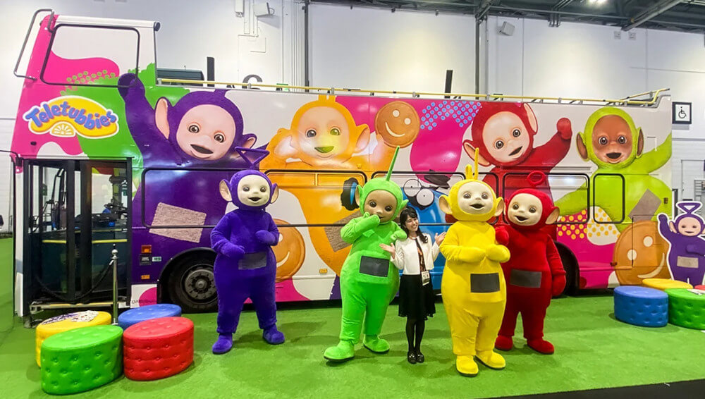 The Teletubbies bus with a guest at an ExCeL exhibition.