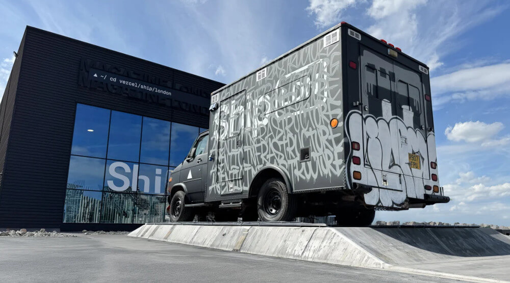 A black American ambulance, branded and wrapped for Vercel in London, by Promohire.