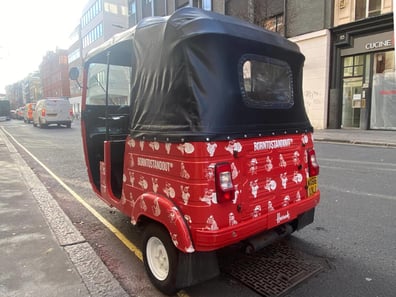The rear of the tuk tuk used for a fragrance campaign in London.
