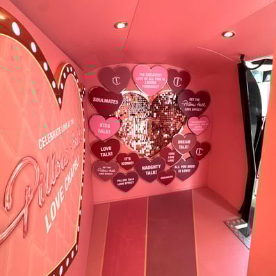 The backdrop to Charlotte Tilbury's photo moment, with various love heats and messages.
