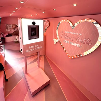 Charlotte Tilbury's polaroid photo moment, with branding.