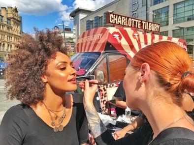 A model gets her make-up done for one of Charlotte Tilbury's immersive experiences.