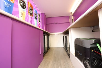 Inside a coffee van with an eco-friendly, green lithium power setup.