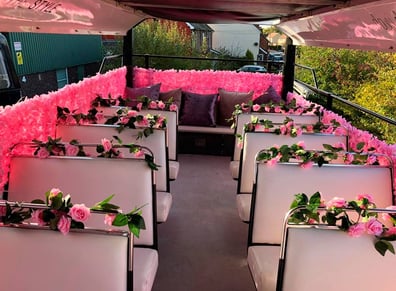 The flowery upstairs of Dani Dyer's hired bus.