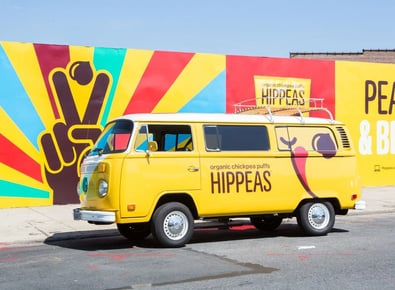 The Hippeas camper van with yellow branding