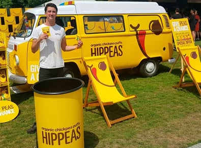 The Hippeas VW camper van hire, with deckchairs and staff