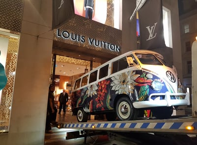 The Louis Vuitton Camper inside a store.