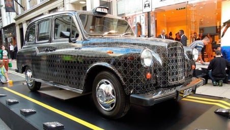 The Dior taxi, parked outside a London store.