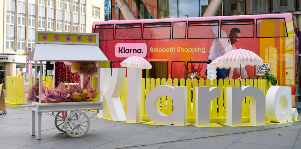 The Klarna campaign vehicle in a brand activation space.
