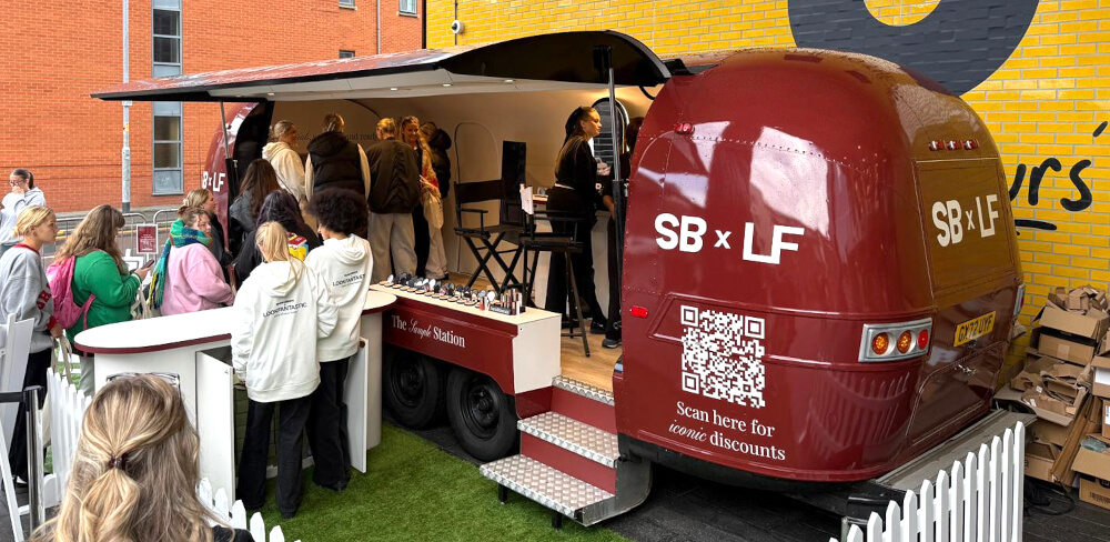 Students get makeovers inside LookFantastic's live campaign Airstream.