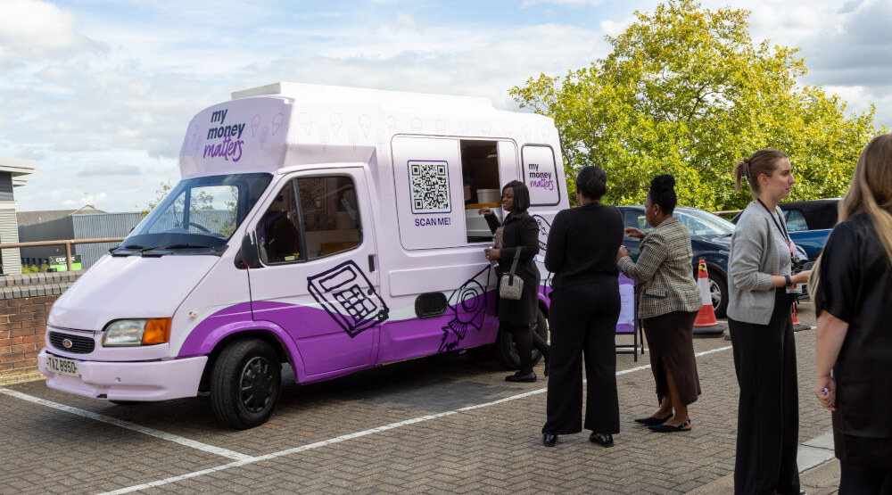 A crowd for the My Money Matters ice cream van awareness campaign.