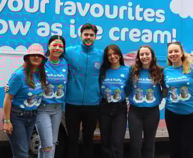 Staff pose for Premier Foods' promotional campaign.