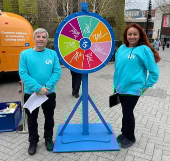 A spin-to-win game with two staff members - great for skincare events and campaigns.