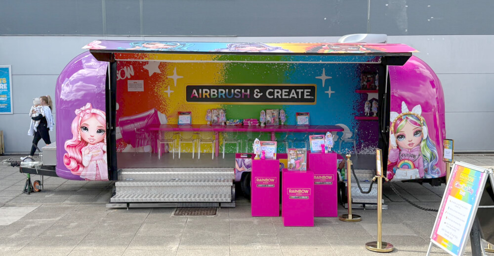 The Rainbow High Airbrush & Create Airstream promotional vehicle.