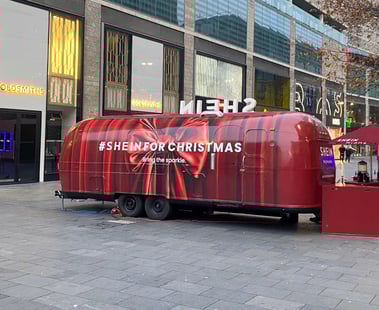 SHEIN's vintage promotional campaign Airstream, seen from behind