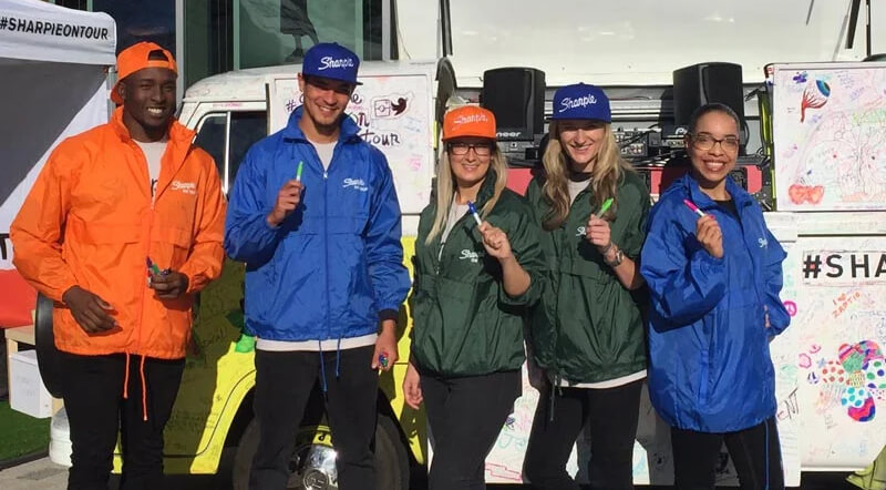 Event staff, aka brand ambassadors, posing for the Sharpie vehicle campaign.