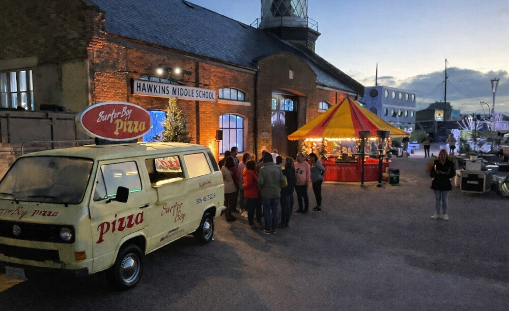 The Stranger Things T3 Surfer Boy Van at London's event, near Hawkins Middle School.