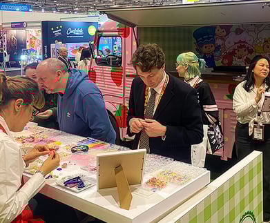 Guests making custom jewellery at the Strawberry Shortcake promotional campaign.
