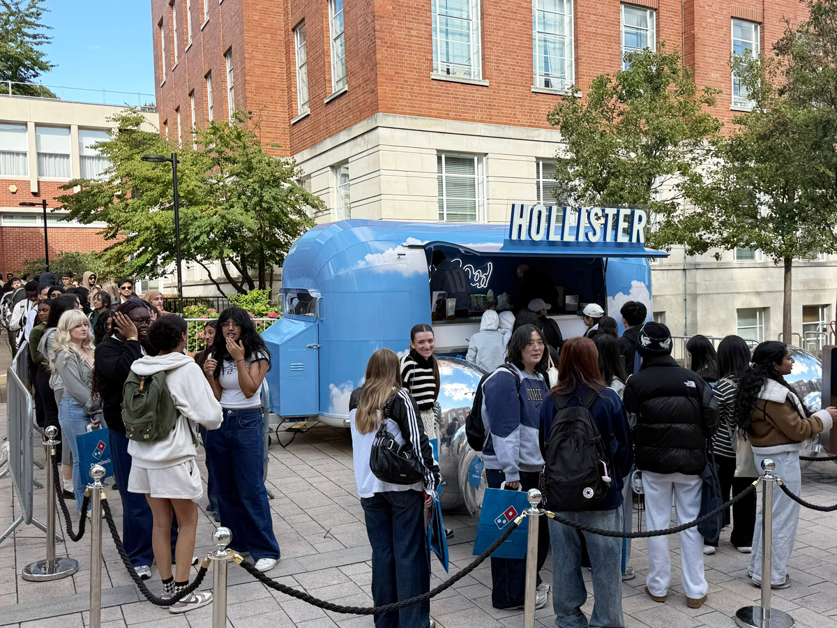An image of Hollister's matcha latte Airstream event, with a crowd of young people.