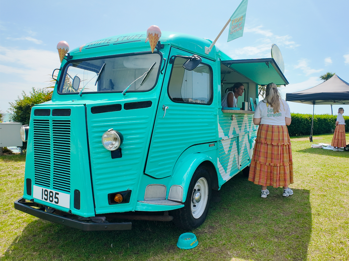 An image of a classic Citroën H Van, in place for an outdoor brand activation or experiential marketing / sampling event.