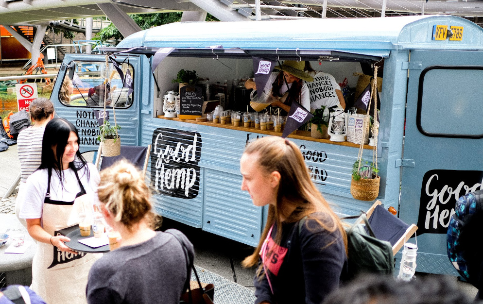 A Guide to Event Sampling & Fulfilment with Promohire - An image of a blue sampling truck