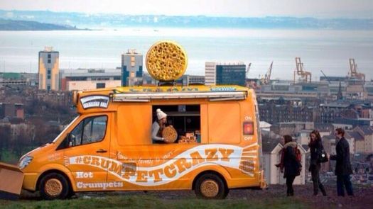 Product sampling campaigns featuring branded ice cream van on the outskirts of a city