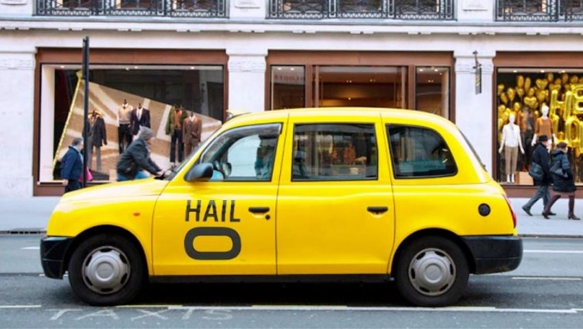 Hail-O taxi rental with branded wrap