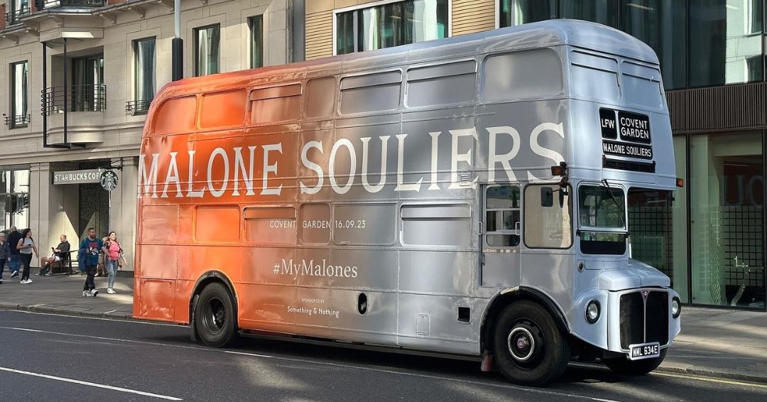 Malone souliers space age gradient hue inspired by inspired by AW23’s mesmerising metallic leather styles: the Markle boots, Maya pumps, and Divine bag Promohire Routemaster